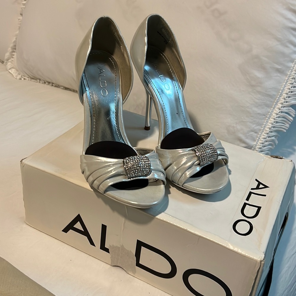 Aldo silver heels with rime stone detail